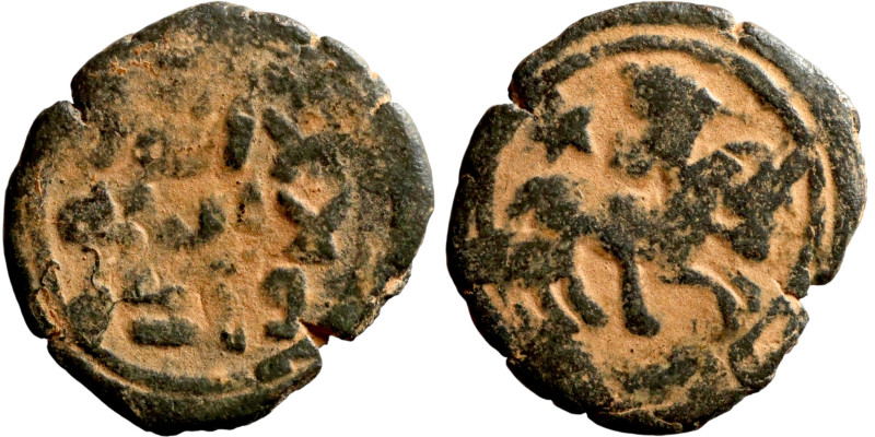 Seljuk (1037–1157, bronze coin. Obverse: Arabic inscription. Reverse: Arabicc in...