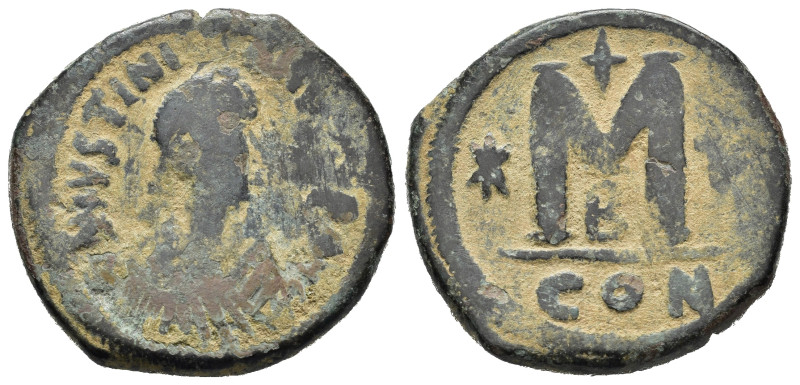 GIUSTINIANO I (527-565). Follis per Costantinopoli. AE (g 17,31). Busto diademat...