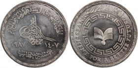 Egypt 5 Pounds 1987 (AH 1407) 
 Egypt 5 Pounds 1987 (AH 1407) Silver KM#651 Investement Bank Mintage:8000 Pcs 
Grade: UNC