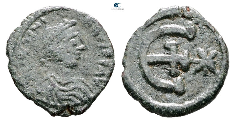 Justinian I AD 527-565. Antioch
Pentanummium Æ

17 mm, 1,94 g



Nearly V...