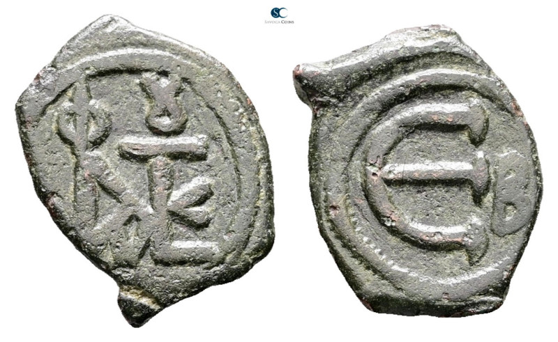 Justin II AD 565-578. Constantinople
Pentanummium Æ

17 mm, 1,52 g



Ver...