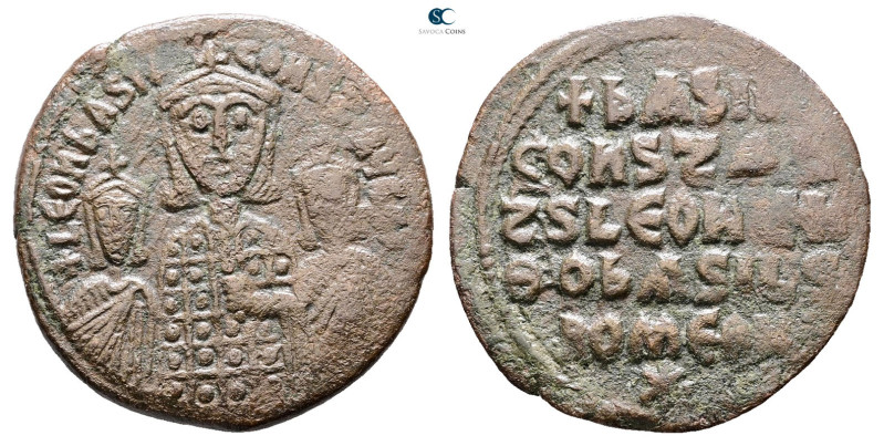 Basil I, with Leo VI and Constantine VII AD 867-886. Constantinople
Follis Æ
...