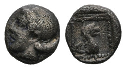 TROAS. Assos. (5th century BC)
AR Obol (7mm 0,44g)
Obv: Head of female left
Rev: A. Head of griffin right in dotted square within incuse square.
a...