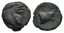 IONIA. Erythrai. (circa 400-370 BC).
AE Bronze (10,6mm 0,7g)
Obv: Head of Herakles to right, wearing lion skin headdress
Rev: Head of bull; behind,...