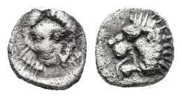 CARIA. Mylasa. (Circa 420-390 BC)
AR Tetartemorion (5,9mm 0,26g)
Obv: Forepart of a lion to right, its head, with open jaws, turned back to left.
R...