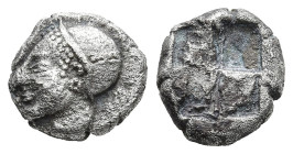 IONIA. Phokaia. (Circa 521-478 BC).
AR Diobol (8,9mm 1,2g)
Obv: Archaic female head left, wearing earring and helmet or close fitting cap.
Rev: Qua...