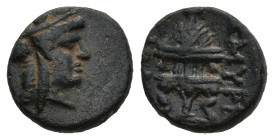 IONIA. Smyrna. (2nd-1st centuries BC)
AE Bronze (10,7mm 1,2g)
Obv: Turreted head of the Amazon of Smyrna as Tyche right
Rev: ΔHMH. Fire altar with ...