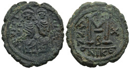 Justin II and Sophia (AD 565-578). Nicomedia. dated RY 10 = 574/5
AE Follis (27.6mm 13.1g)
Obv: D N IVSTINVS P P AVG. Nimbate figures of Justin and ...