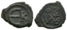 Justin II (565-578 AD). Kyzikos
AE Pentanummium (15,9mm 1,8g)
Obv: Monogram of Justin II
Rev. Large E; to right, K
DOC 137. MIBE 53. SB 375