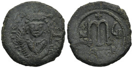 Tiberius II Constantine (AD 578-582). Nicomedia. Dated RY 7 = 584/5
AE Follis (28.8mm 12.45g)
Obv: Crowned bust facing, wearing consular robes, hold...