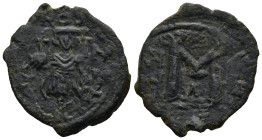 Tiberius III, Apsimar (AD 698-705). Constantinople
AE Follis (25,6mm 5,7g)
Obv: Tiberius standing facing, holding globus cruciger and long cross.
R...