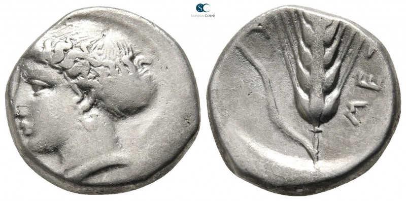 Lucania. Metapontion 400-340 BC. 
Nomos AR

19 mm., 7,47 g.

Head of Demete...