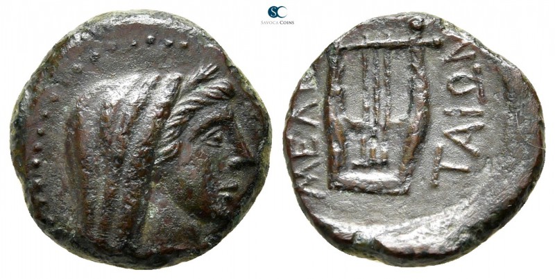 Sicily. Melita 89 BC. 
Triens Æ

14 mm., 2,43 g.

Veiled head of Demeter ri...