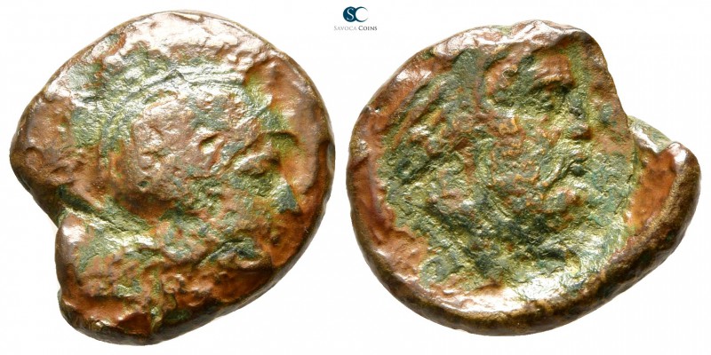 Akarnania. Alyzia 330-280 BC. 
Bronze Æ

19 mm., 4,37 g.

Helmeted head of ...
