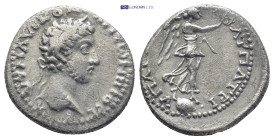 Cappadocia, Caesarea-Eusebia. Commodus (177-192). AR Didrachm (4.6 Gr. 18mm.) 
Laureate head right. 
Rev. Nike standing right on globe, holding palm f...