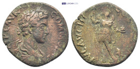 PISIDIA, Parlais. (?) Commodus, 253-260 AD. AE. (22mm, 6.0 g) Laureate, draped and cuirassed bust of Commodus, right. Rev. Mên standing facing, head t...