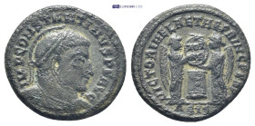 Constantine I the Great AD 306-337. Siscia Follis Æ (17mm, 2.9 g) IMP CONSTANTINVS P F AVG, laureate, helmeted and cuirassed bust right / VICTORIAE LA...