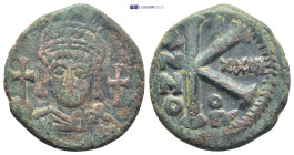 Justinian I. 527-565 AD. AE 20 Nummi - Half Follis (25mm, 8.6 g), Theoupolis (Antioch) mint. Dated RY 23. Helmeted, pearl-diademed and cuirassed bust ...