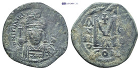 MAURICE TIBERIUS.(582-602).Constantinople.Ae. (31mm, 12.3 g) Obv : D N MAVRC TIbЄR P P AVG. Helmeted and cuirassed facing bust of Maurice Tiberius, ho...
