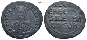 Leo VI 'the Wise' Æ Nummus. (26mm, 6.39 g) Constantinople, AD 886-912. ⧾ LEOҺ bASILEVS ROM, crowned bust facing, holding akakia / ⧾ LЄOҺ ЄҺ ΘΕΟ bASILЄ...
