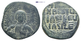 Attributed to Basil II and Constantine VIII AD 976-1028. Constantinople Anonymous follis Æ. Class 2 (28mm., 11,75 g).+ ЄMMA]-NOVH[Λ], nimbate bust of ...