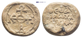 Byzantine Lead Seal (24mm, 17.1 g) ΘEOTOKE BOHΘEI in the form of a cruciform monogram. Rev. Legends in four lines.