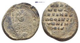 Byzantine Lead Seal (27mm, 11.46 g) Bust of St. George holding a spear and shield. Rev. Legends in six lines.