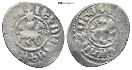 Cilician Armenia. Levon III AR Takvorin. 1301-1307. (2.2 Gr. 22mm.)
Levon III crowned, riding on horseback to right, holding sceptre ending in cross, ...