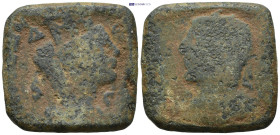 Bronze coin weight (23mm, 13.2 g) Obv: Radiate and cuirassed bust of Philip left. Rev: Veiled and turreted bust of Tyche to right; above, ram leaping ...