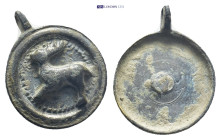 Bronze pendant with stag figure. (19mm, 2.8 g)