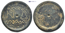 Byzantine four-nomismata weight (23mm, 17.2 g)