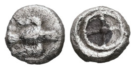 Ionia, Magnesia ad Maeandrum?. AR, Hemiobol. 0.39 g. - 6.98 mm. ca. 500-464 BC.
Obv.: Facing eagle with spread wings and legs.
Rev.: Wheel within roun...