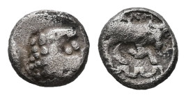 Ionia, Magnesia ad Maeandrum. AR Tetartemorion, 0.21 g 5.51 mm. Circa 400-350 BC.
Obv: Laureate head of Apollo right.
Rev: [MAΓNH]. Bull butting right...