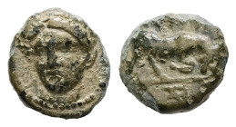 Ionia, Phygela. Ae, 0.45 g 8.07 mm. Circa 350-300 BC.
Obv:Laureate head of Artemis Munychia facing slightly to left
Rev: Bull butting right, [ΦYΓ] abo...