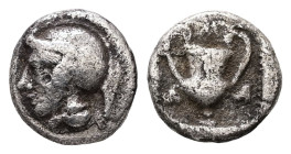 Lesbos, Methymna. AR Obol, 0.51 g 8.25 mm. 450/40-406/379 BC.
Obv: Helmeted head of Athena left.
Rev: Kantharos between ivy leaves; M above.
Ref: HGC ...