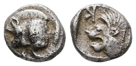 Mysia, Kyzikos. AR Obol, 0.79 g. - 9.05 mm. Circa 450-400 BC.
Obv.: Forepart of boar left; tunny to right.
Rev.: Head of roaring lion left; retrograde...