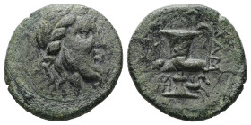 Mysia, Lampsakos. Ae, 3.25 g 18.40 mm. Circa 190-85 BC.
Obv: Bearded head of Priapos right, wreathed with ivy .
Rev: Kantharos; ΛΑΜ to right, monogram...