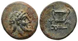 Mysia, Lampsakos. Ae, 4.72 g 20.32 mm. Circa 190-85 BC. 
Obv: Bearded head of Priapos to right, wreathed with ivy 
Rev: [ΛΑΜ]ΨΑ Kantharos; kerykeion b...