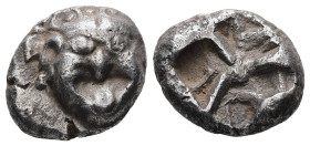 Mysia, Parion. AR Drachm, 3.93 g. – 14.98 mm. 5th century BC.
Obv.: Facing gorgoneion with protruding tongue.
Rev.: Disorganized linear pattern within...