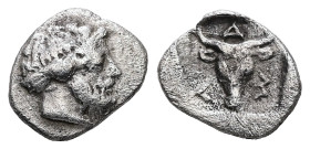 Troas, Lamponeia. AR Obol, 0.46 g 9.67 mm. 4th century BC.
Obv: Bearded head of Dionysos right.
Rev: ΛAM, Facing boukranion within incuse square.
Ref:...