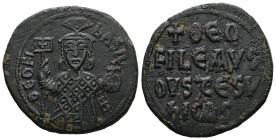 Theophilus, AD 829-842. AE, Follis. 9.29 g. 29.16 mm. Constantinople.
Obv: ΘEOFIL-bASIL. Crowned, three-quarter length figure of Theophilus facing, pe...