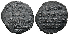 Leo VI the Wise, AD 886-912. AE, Follis. 5.55 g. 25.59 mm. Constantinople.
Obv: + LЄOҺЬAS-ILЄVSROM. Frontal bust of Leo VI with short beard wearing ch...