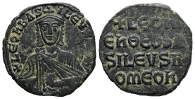 Leo VI the Wise, AD 886-912. AE, Follis. 5.69 g. 24.17 mm. Constantinople.
Obv: + LЄOҺЬAS-ILЄVSROM. Frontal bust of Leo VI with short beard wearing ch...