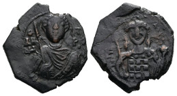 John II Comnenus, AD 1118-1143. AE, Half Tetarteron. 2.26 g. 18.81 mm. Thessalonica.
Obv: ΔΙ / ΜΙ—T / RO / I. St. Demetrius nimbate, facing, no beard,...