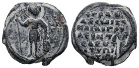 PB Byzantine seal of Leo (AD 11th century)
Obv: Standing figure of St George holding a lance in his right hand and a shield in his left. Sigla in two...