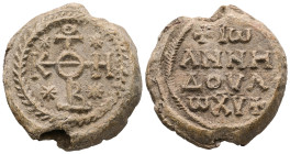 PB Byzantine seal of Ioannes (AD 8th-9th centuries).
Obv: Cruciform invocative monogram: Θεοτόκε βοήθει. A star in each quarter.  Wreath border.
Rev...