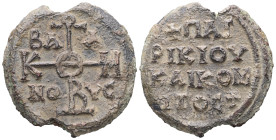 PB Byzantine seal of Baanes, patrikios and komes.  (AD 8th century).
Obv: Cruciform invocative monogram (type V); Θεοτόκε βοήθει ; In the quarters: Β...