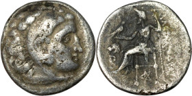 Alexander iii and successors. Silver Drachm Obverse: Head of Herakles to right, wearing lion skin headdress Rev: Zeus seated left on low throne, holdi...