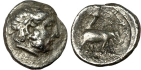 Seleucid Kingdom: Seleukos I Nikator AR Drachm Obverse: Laureate head of Zeus right Reverse: Athena, brandishing spear and shield, driving elephant qu...