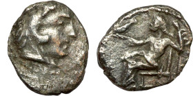 Alexander iii and successors. Silver Drachm Obverse: Head of Herakles to right, wearing lion skin headdress Rev: Zeus seated left on low throne, holdi...